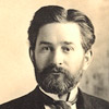 Dr. Ernest Grosskopf in a fornal posed portrait